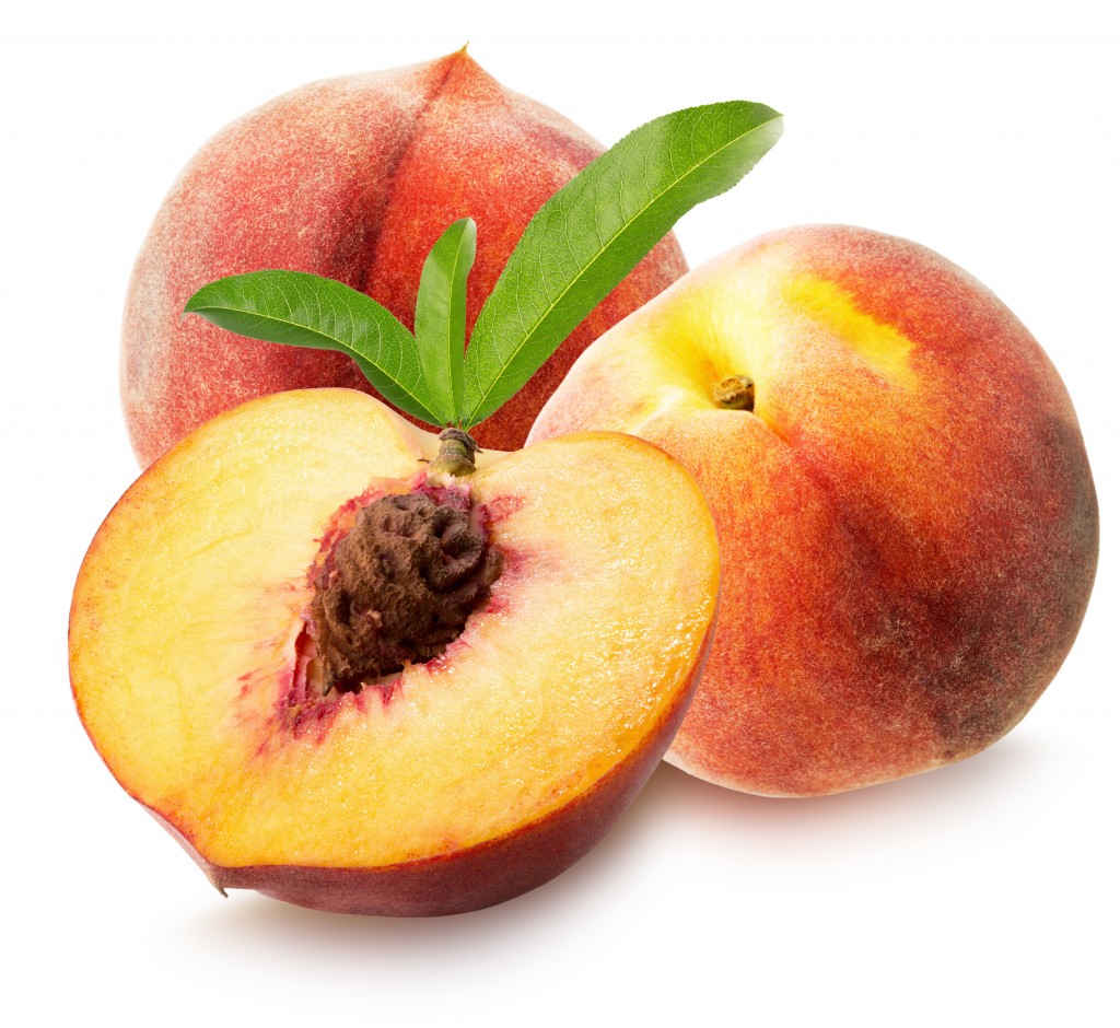 peaches with leaves isolated on the white background.